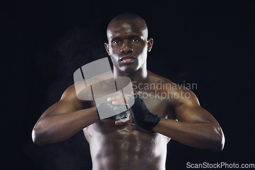 Image of Boxer, fitness and portrait of strong black man on dark background for workout, exercise and training. Boxing, muscle and face of male body builder with dedication, motivation and focus in studio