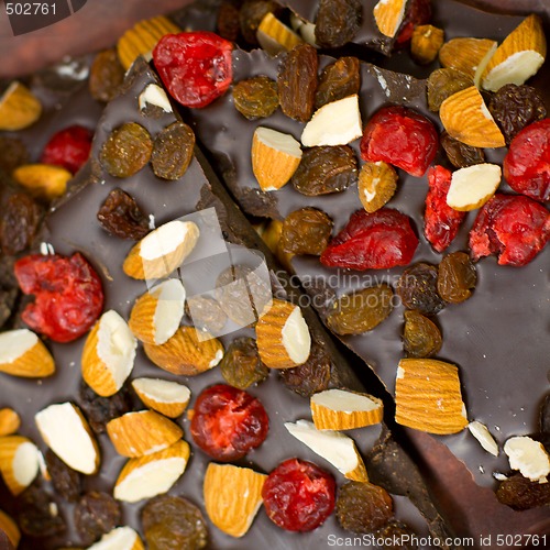 Image of chocolate with berries and nuts