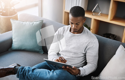 Image of Relax, tablet and man on sofa from above with social media post, email or streaming video on subscription service. Networking, internet and connection, male surfing online shopping website on couch.