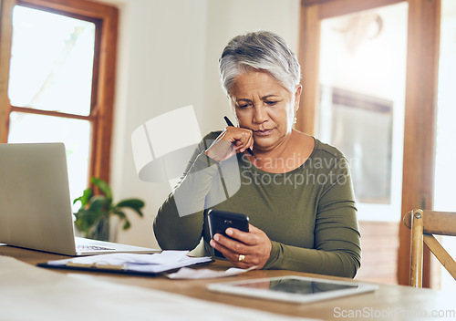 Image of Senior woman, budget planning and mobile savings checklist with phone at home. Pension, contract and elderly female person with debt, online tax and paper form in a house with bills and web admin