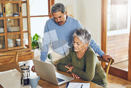 Image of Finance, budget and senior couple on laptop with bills, paperwork and documents for life insurance. Retirement, pension and elderly man and woman on computer for mortgage payment, investment and tax