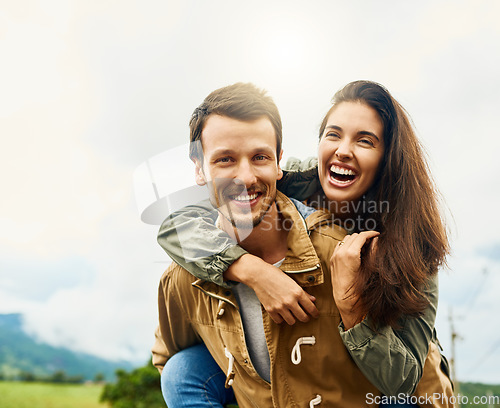 Image of Laugh, love and piggyback with portrait of couple in nature for happy, smile and bonding. Happiness, relax and care with man carrying woman on countryside date for spring, vacation and support