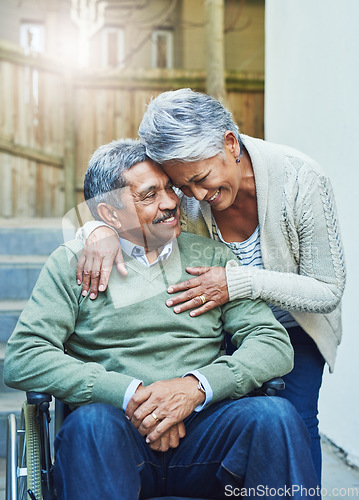 Image of Disability, wheelchair and senior couple hug with care, support and love by elderly happy people in retirement. Disabled, rehabilitation and old man with helping woman with empathy in marriage