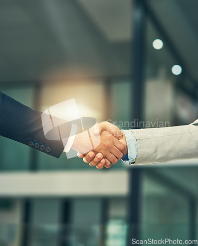 Image of Partnership, handshake and hands of business people in office for hiring, recruitment deal and thank you. Corporate, collaboration and male workers shaking hands for onboarding, support and teamwork