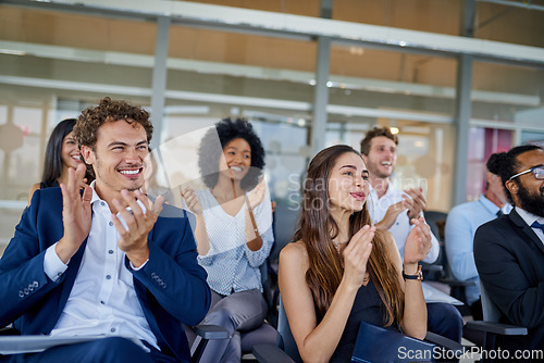 Image of Business, applause and conference for an agreement and support at a presentation with office team. Seminar, professional and workshop congratulations with smile at a meeting with an audience at work.