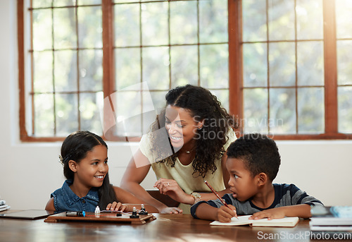 Image of Education, children and mother with girl, boy and doing homework or learning on a dining room table or parent and together. Family, home and school with mom teaching her daughter or son and indoors