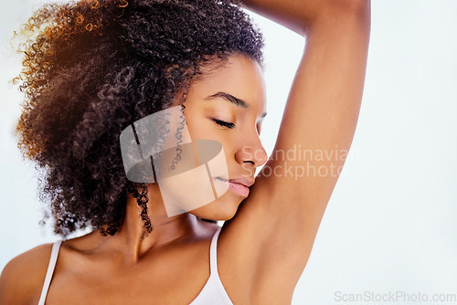 Image of African woman, smelling armpit and home bathroom with youth, fragrance and clean for morning routine. Girl, hygiene and grooming for cleaning, fresh scent or check for self care, wellness or health