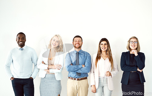 Image of Group, portrait and business people with arms crossed by white wall background mockup space in office. Face, confident smile and employees standing together with teamwork, diversity and collaboration