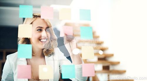 Image of Happy business woman, brainstorming and sticky note for planning target, goals and agenda at glass window. Face of female worker smile for schedule, ideas and mindmap of vision, objectives and mockup