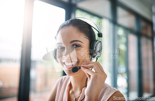 Image of Call center, customer service and portrait of woman in the office on an online consultation. Contact us, communication and face of female telemarketing consultant with crm with headset in workplace.