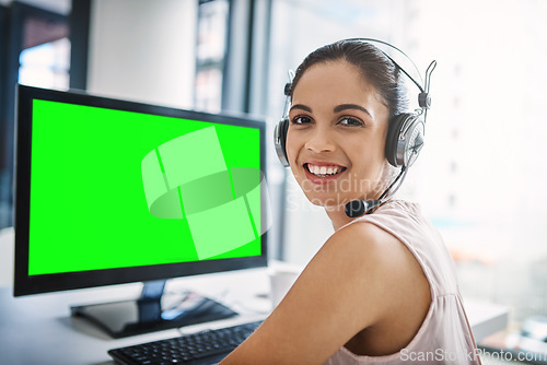 Image of Happy woman, call center and green screen on computer in customer service or telemarketing at office. Portrait of female person, consultant or agent smiling on PC with chromakey or mockup display