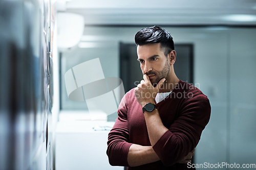 Image of Wall, thinking and business man focus on ideas, planning or problem solving solution, strategy or office plan. Development, information analysis and professional person contemplating project idea