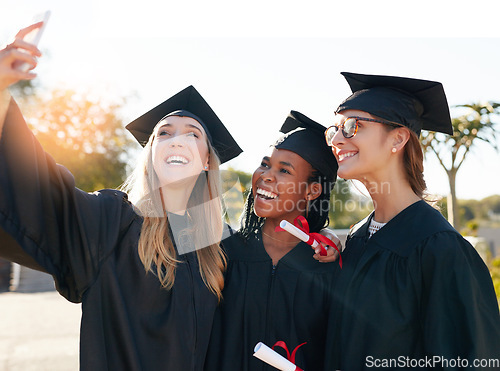 Image of Friends, students and graduation selfie with college or university women together with a smile. People outdoor to celebrate education achievement, success and future at event for school graduates