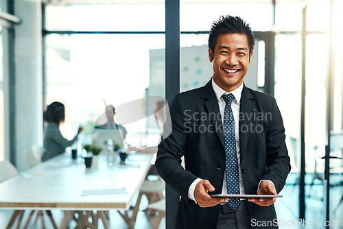 Image of Office, portrait and asian businessman with tablet or confident, leadership or corporate executive in workplace or management. Man, manager or professional worker or employee with technology