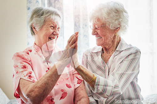 Image of Happy, friends and senior women with a high five for care, retirement support and happiness. Smile, team and elderly people with excited for solidarity or achievement success in nursing home together