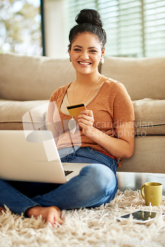 Image of Woman relax with laptop, credit card and online shopping with payment on store website, fintech and smile in portrait. Female person at home, happy with internet banking and finance with e commerce