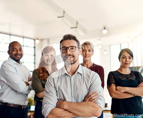 Image of Businessman, portrait and team with arms crossed in management, leadership or creative group at the office. Confident business people or professional in teamwork, startup or about us at the workplace