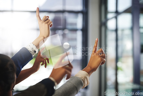 Image of Hands up, workshop or business people in presentation asking questions for an answer or ideas. Teamwork, faq or employees with hand raised in group discussion meeting for problem solving or solution