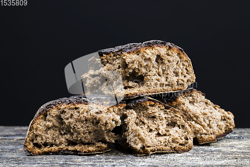 Image of black homemade rye flour bread