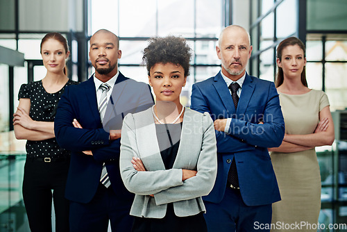 Image of Portrait, business people or serious teamwork with arms crossed for diversity, professional commitment or office pride. Group, African woman or global collaboration leadership of corporate employees