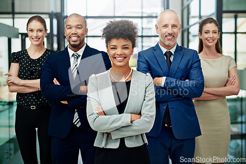 Image of Portrait, diversity and happy business people with arms crossed for professional commitment, pride or teamwork. Group, African woman leader and corporate employees smile for global company unity