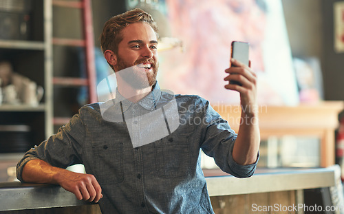 Image of Happy selfie, art and gallery man on video call, vlog or post photo memory to social media, web or app. Artist, creative studio or person smile in startup store, small business or painting exhibition