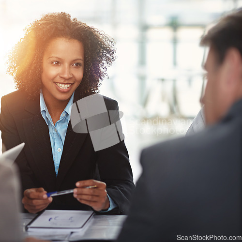 Image of Legal, African woman lawyer in a meeting and with client in her office at work. Collaboration or teamwork, people talking about a case and black female attorney with a male person in boardroom