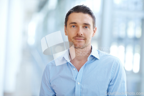 Image of Businessman, portrait and serious face in modern office mockup for professional, about us and confidence. Corporate mock up, worker and mature male employee or CEO, entrepreneur and background space