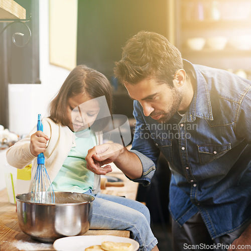 Image of Learning, breakfast and father with daughter in kitchen for pancakes, bonding and cooking. Food, morning and helping with man and young girl in family home for baking, support and teaching nutrition