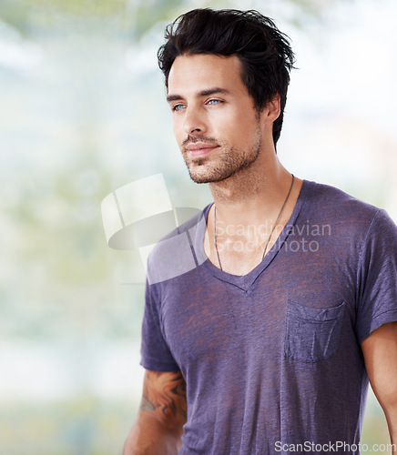 Image of Young model, confident fashion male and outdoors in blur background. Beard or facial hair, elegant or casual posture and thinking or contemplating person with mockup space in forest or woods