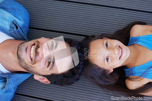 Image of Relax, floor portrait or happy father, daughter or family smile for Fathers day, parenthood or outdoor peace, care or unity. Weekend, face top view or young kid, girl or youth person bonding with dad