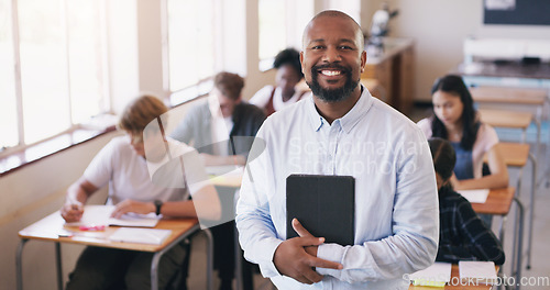 Image of Portrait, black man and teacher in a class, students and smile with knowledge, education and development. Face, male person and educator with a test, exam or learning in a school, happiness or growth