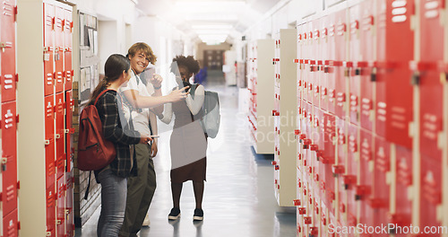 Image of Happy, friends and phone for social media at school, communication and streaming for education. Smile, diversity and group of students on mobile app in hallway for learning and internet conversation