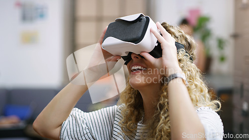 Image of VR, future and woman in the metaverse, digital or virtual reality in a technology agency or futuristic startup company. Smile, fantasy and person happy to use internet, online and 3D web tech