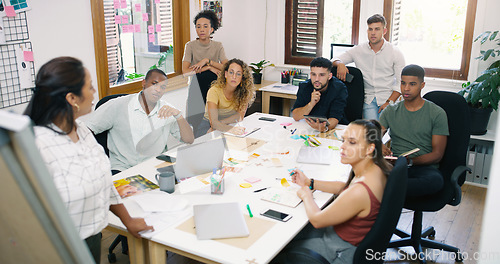 Image of Planning, presentation and business people brainstorming in office boardroom while doing research. Collaboration, teamwork and group of corporate employees working on project in meeting in workplace.