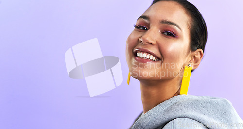 Image of Young woman, portrait and makeup with jewelry, happiness and mockup in studio. Purple background, female person and gen z fashion with face and millennial style with a smile and beauty cosmetics