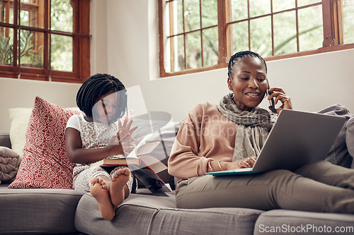 Image of Black woman, phone call and laptop with child in home with book on a computer with remote work. Happy, kid and mobile connection of a girl reading with mama in a conversation from freelancer job