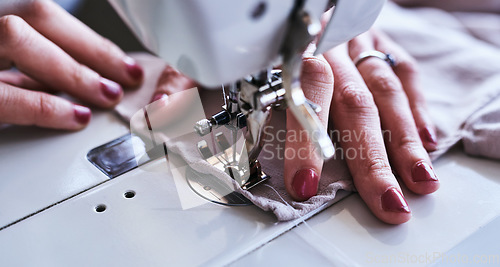 Image of Fashion, closeup of hands of woman at sewing machine for small business, creative ideas and focus at studio. Creativity, startup and zoom on hand of textile designer, sewer or tailor stitching fabric