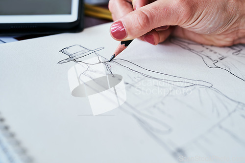 Image of Woman, hands and fashion design closeup of drawing on paper in planning, idea or sketching on desk. Hand of creative female person, artist or graphic designer for clothing sketch ideas for startup