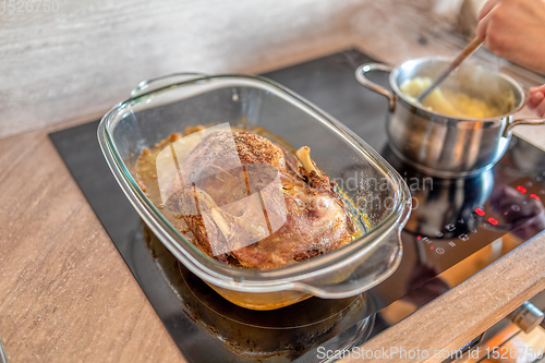 Image of roast duck in the oven