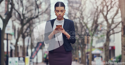 Image of City, business and woman with a smartphone, typing and connection for social media, website info and communication. Female person, employee and consultant with a cellphone, online reading and outdoor