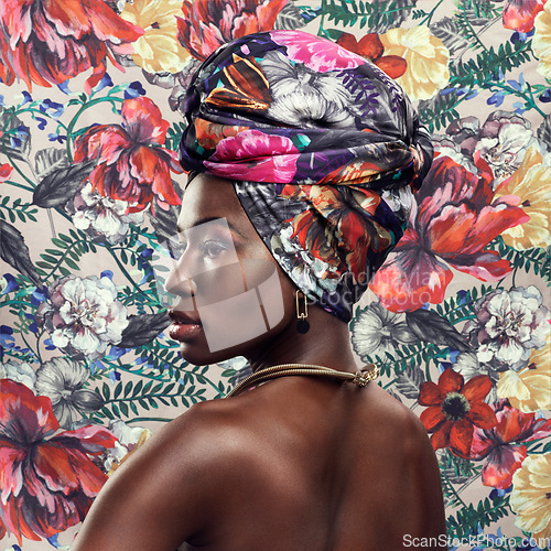 Image of Fashion, beauty and profile of black woman on flower background with glamour, cosmetics and makeup. Floral pattern, design and face of female person in exotic jewelry, African style and head scarf