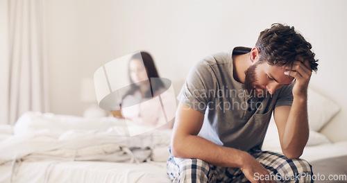 Image of Angry couple, argument and fight on bed in disagreement, conflict or toxic relationship at home. Upset and frustrated man and woman fighting, breakup or divorce from affair or infertility in bedroom