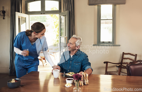 Image of Senior man, nurse and breakfast with check, talking and happy with food, nutrition and care in nursing home. Retirement, assisted living or helping hand from woman in house with conversation for diet