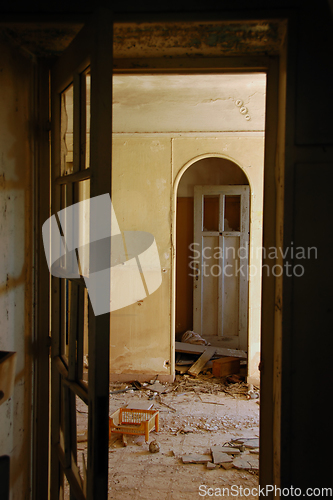 Image of broken doors in abandoned interior