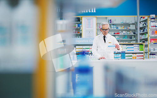 Image of Pharmacy product, senior man and pharmacist reading pharmaceutical, supplements or pills package info. Typing, drug store medicine and medical person research supplement prescription information