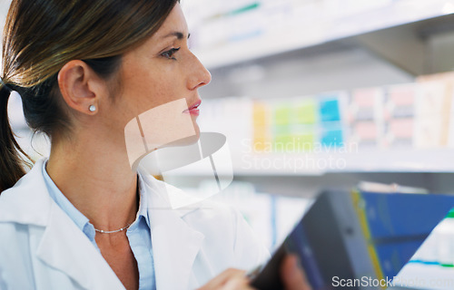 Image of Pharmacy clipboard, store shelf and woman check, search and doing inventory stock take of pills, supplements or medicine. Healthcare shop, pharmaceutical and female pharmacist with product checklist