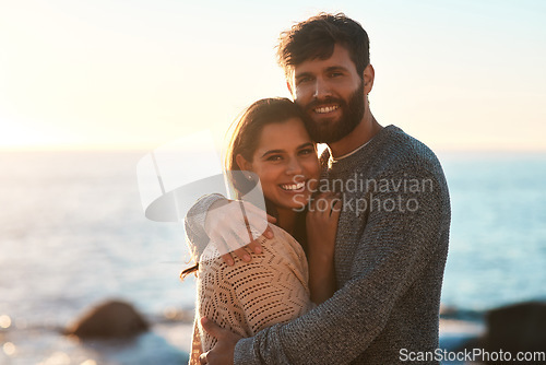 Image of Love, beach and portrait of couple hug for relaxing, bonding and quality time on romantic date. Nature, travel and man and woman embrace for anniversary or honeymoon on holiday, weekend and vacation