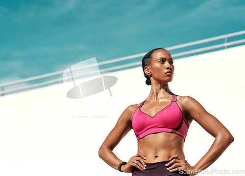 Image of Sports, serious fitness and woman with mockup, blue sky at outdoor gym for health and wellness. Workout, exercise and power, athlete with focus and mock up space for healthy mindset for summer goals.