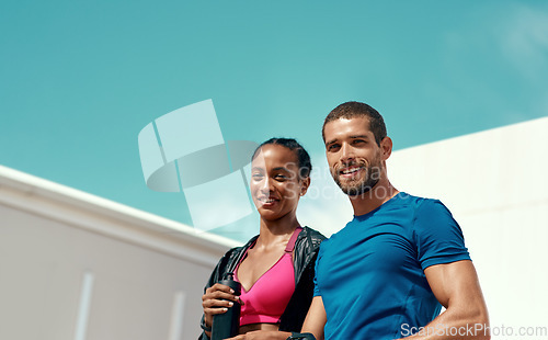 Image of Fitness, portrait of happy woman and man with blue sky, mockup at outdoor gym for health and wellness in sports. Workout, exercise and personal trainer with athlete, smile and healthy mindset goals.